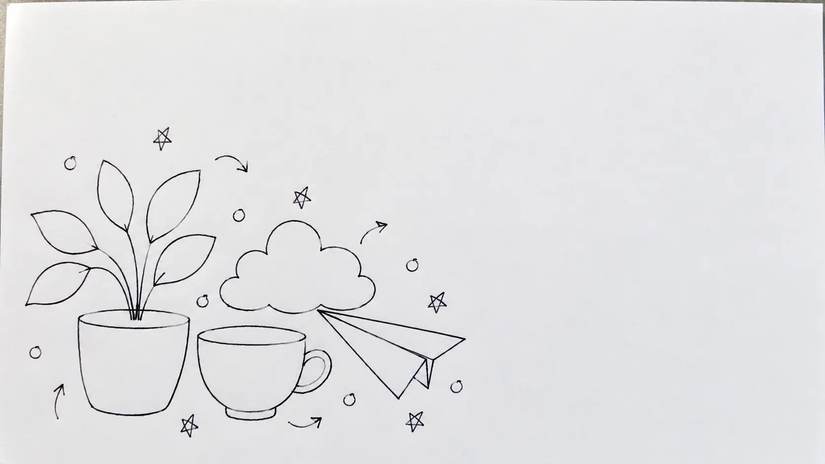 A finished doodle page where a few large drawings anchor the layout, smaller ones overlap around them and one area of the paper is deliberately left blank